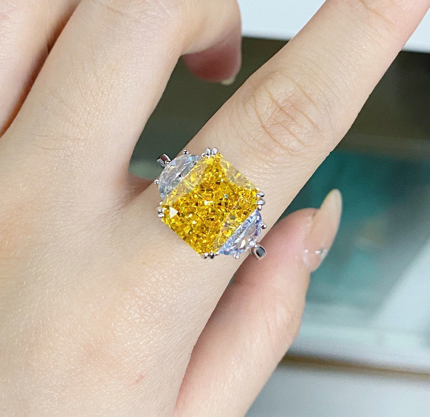 Luxury lavishly adorned 10-carat yellow diamond ring, high-end texture with a dazzling sparkle.