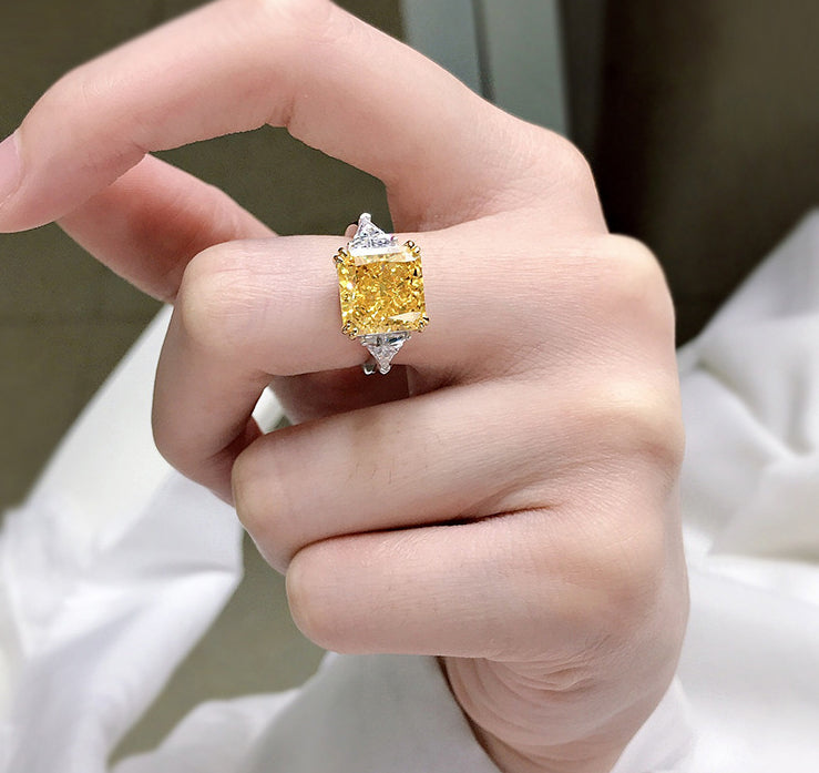 Luxury lavishly adorned 10-carat yellow diamond ring, high-end texture with a dazzling sparkle.