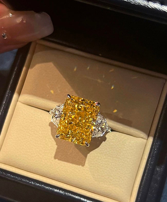 Luxury lavishly adorned 10-carat yellow diamond ring, high-end texture with a dazzling sparkle.